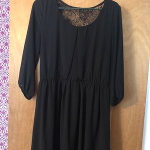 Long sleeve, large black dress